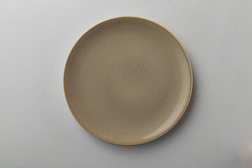 Top view shot of a plate on white background.