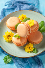 Delicious orange macaroons as a tasty small snack