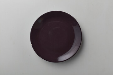 Top view shot of a plate on white background.