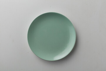 Top view shot of a plate on white background.
