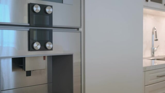 close up of Modern Electric Oven  with background of moden pantry kitchen home interior concept