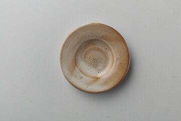 Top view shot of a plate on white background.