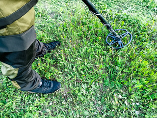 Man with metal detector, magnetic hobby,magnetic coil