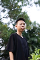 close up young man in nature garden