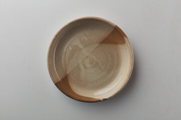 Top view shot of a plate on white background.
