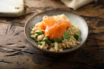 Healthy bowl with salmon and avocado