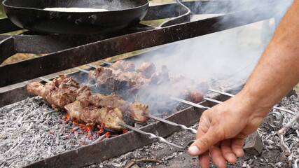 Real kebabs  charcoal grills. outdoor cooking. Rest during quarantine. Picnic in nature. Prepare food in the garden.