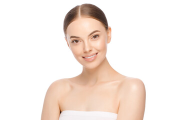 Portrait of beautiful smiling female standing with naked shoulders, isolated on white background....
