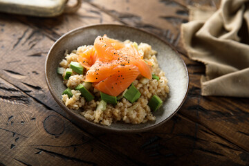 Healthy bowl with salmon and avocado