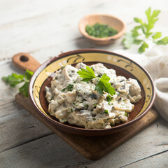Homemade mushroom stew with cream and parsley