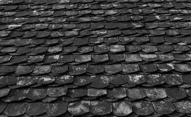 Texture of a roof with old roof tiles.