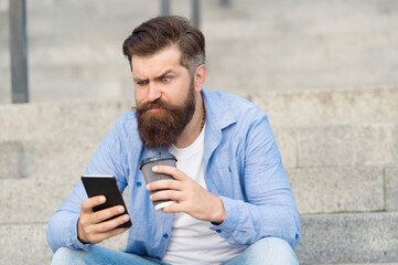 Living online life. Social networks. Modern life online communication. Guy with smartphone urban...
