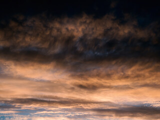 Dark gradient of the evening sky. Colorful cloudy sky at sunset. Sky texture, abstract nature background