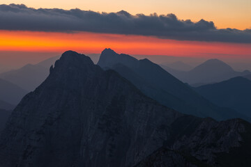 Obraz na płótnie Canvas Morning view of the Kosuta ridge in Karavanke range alps before the sunrise, Slovenia