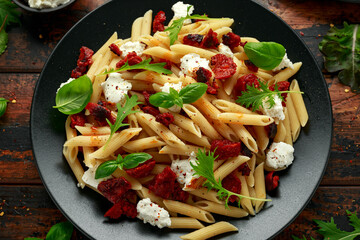Chorizo, Penne pasta with creamy ricotta cheese and greens
