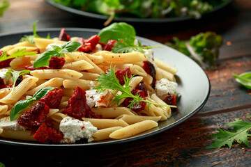 Chorizo, Penne pasta with creamy ricotta cheese and greens