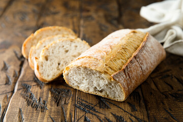 Homemade ciabatta bread on a wooden desk