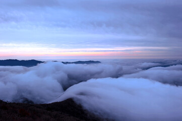 Beautiful sea of clouds at dawn on the top of the mountain.