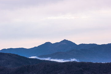 Fototapeta premium Beautiful sea of clouds at dawn on the top of the mountain.