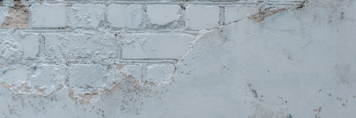 large white brick and concrete wheathered wall exterior