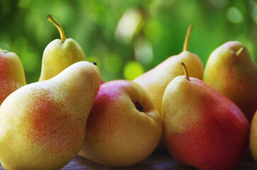 group of ripe pears on table