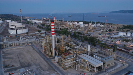 Aerial drone photo of industrial oil and gas plant in Corinth area overlooking Saronic gulf at...