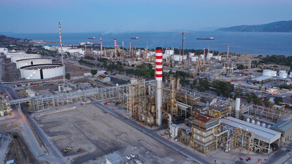 Aerial drone photo of industrial oil and gas plant in Corinth area overlooking Saronic gulf at...