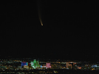 NEOWISE Comet over downtown Reno Nevada in the night sky.