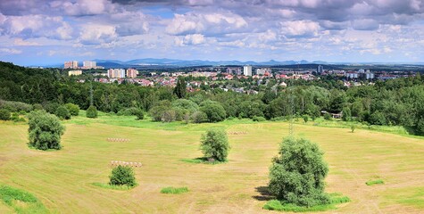 Fototapeta na wymiar Sunny landscape with czech city of Chomutov on 29th june 2020