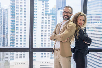 Male businessmen and female marketing staff, colleagues, and buddy in a successful collaboration
