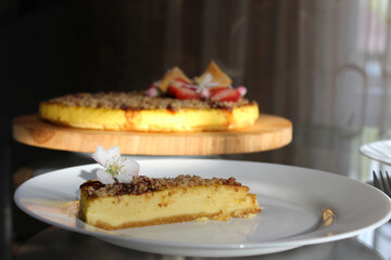 Dessert. A slice of cheese cake without sugar. On the restaurant.