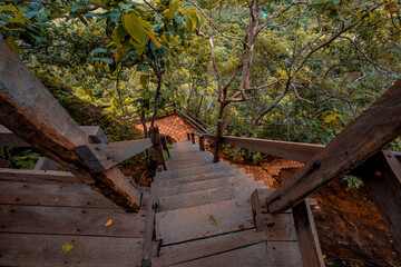 Background of wooden walkways (wooden bridges) created for high-angle views on mountains, natural attractions, or parks that have forest preservation