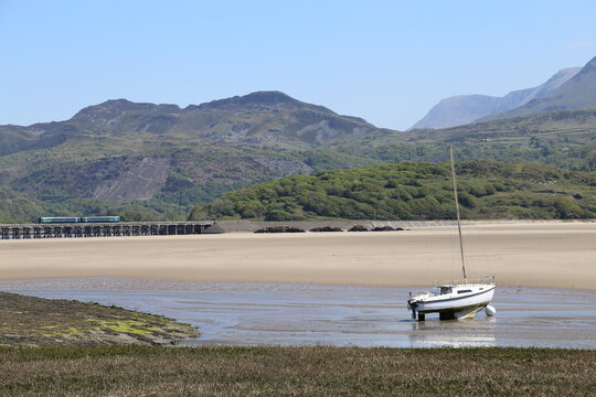 A yacht moored in Mawddach Estuary at Fairbourne in Gwynedd, Wales, UK.
