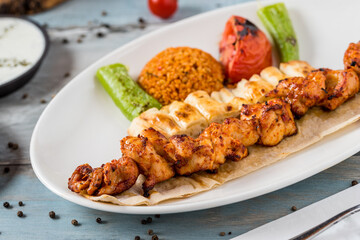 Traditional Turkish grilled Chicken shish kebab with vegetables grilled on skewers