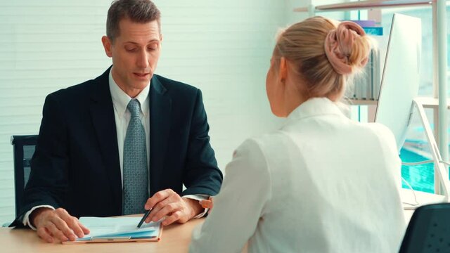 Job seeker in job interview meeting with manager and interviewer at corporate office. The young interviewee seeking for a professional career job opportunity . Human resources and recruitment concept.