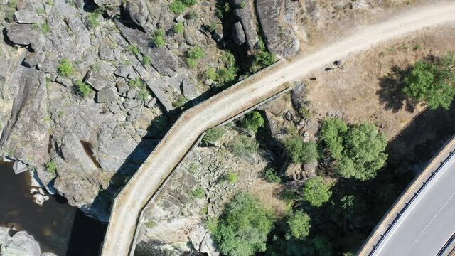 birds eye view of the ancient bridge over the Coa river (Ponte Grande sobre o rio C&ocirc;a) next to Almeida, Guarda district, Portugal