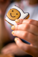 Smiley cookies in the hands