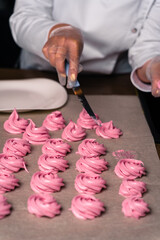 The process of making zephyr marshmallow at pastry shop kitchen.