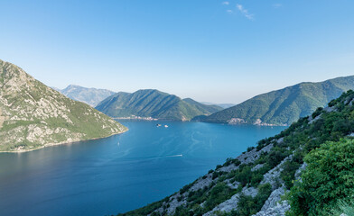 Obraz premium Bay of Kotor with several boats at sunset