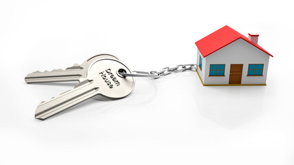 Keys and house. Key chain of a house with two keys and the text Dream House. Real estate concept with house and key. Idea for real estate concept, personal property.