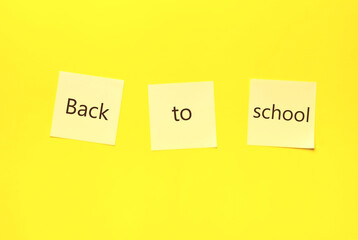Back to school concept. Sticky notes on Yellow nackground
