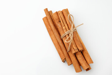 Top view flat lay a cinnamon stick is herb seasoning aromatic isolated.