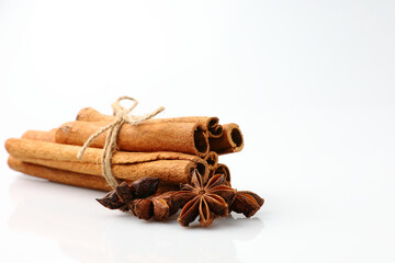 Close up anise star with cinnamon stick is herb seasoning aromatic isolated.