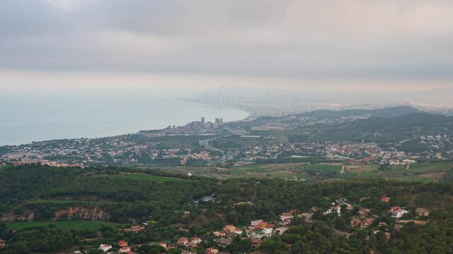 Time-lapse of the sunset on the Barcelona el Maresme coast. We can see the exit motorway to the north of Barcelona. And the towns of Alella, Masnou, Montgat, Badalona and in the background Barcelona. 
