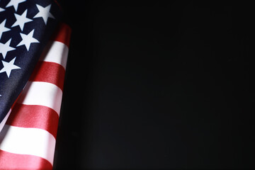 American flag on a mirror background. Symbol of the United States of America. Star-striped flag on...