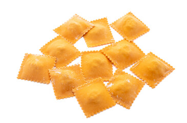 Fresh ravioli pasta colored with paprika isolated on a white background, copy space