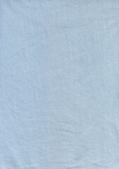 A sky blue color fabric Background. A jeans fabric use for making shirt.