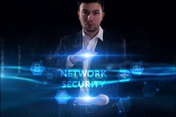 Business, Technology, Internet and network concept. Young businessman working on a virtual screen of the future and sees the inscription: Network security