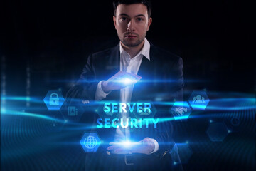 Business, Technology, Internet and network concept. Young businessman working on a virtual screen of the future and sees the inscription: Server security