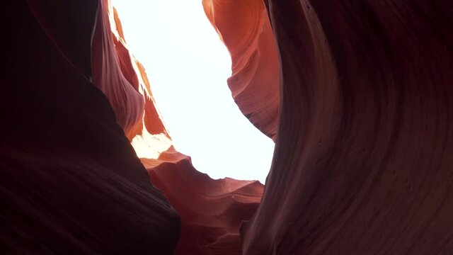 Camera pointing into the bright sky of the Antelope Canyon in Arizona (USA) with a clean camera movement, Shot in 4K